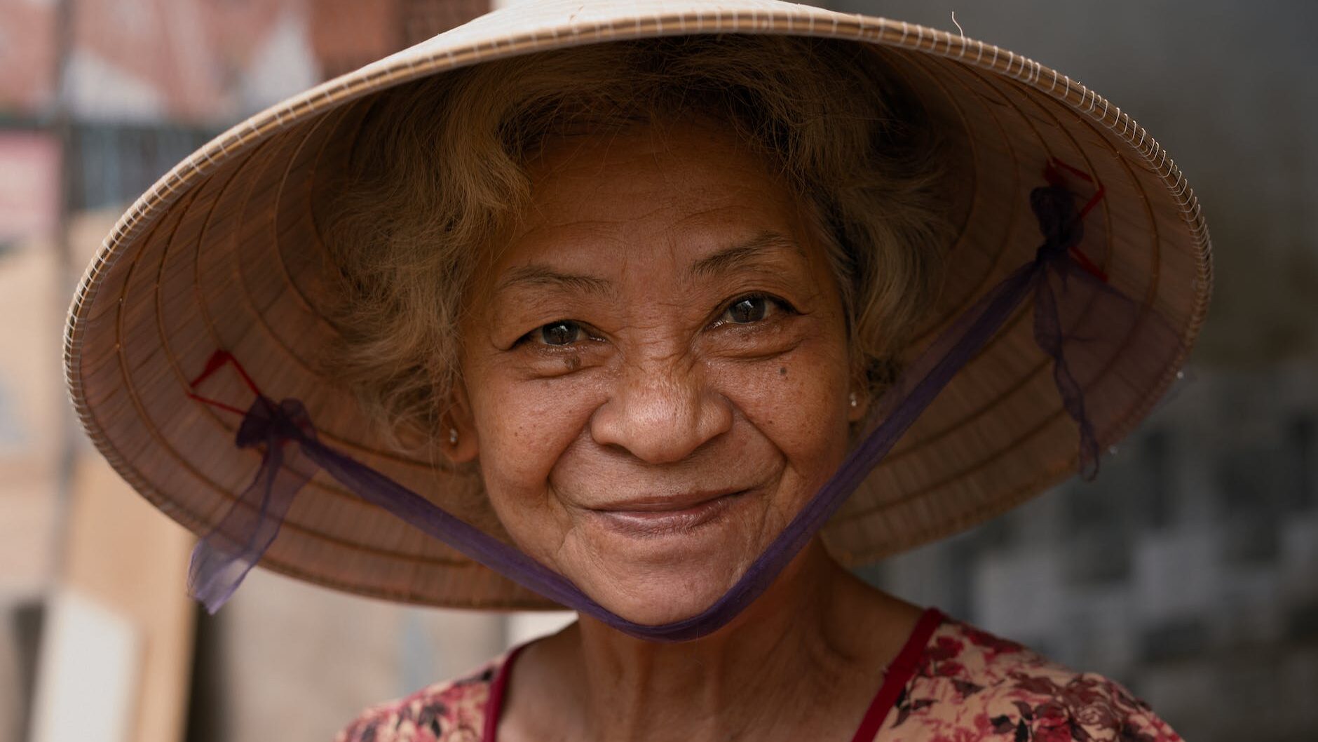 woman wearing brown wicker hat