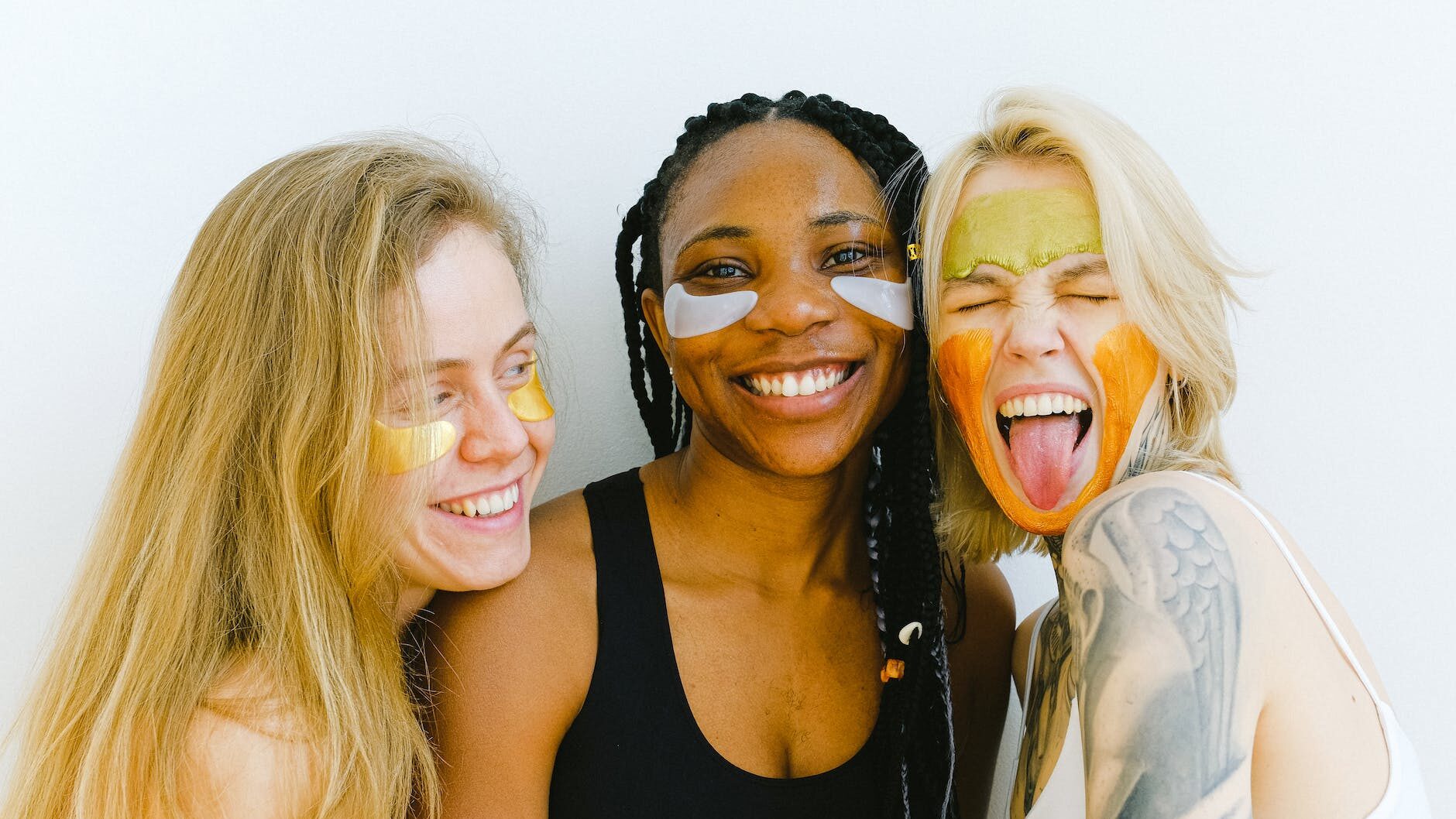 photo of women doing their skincare