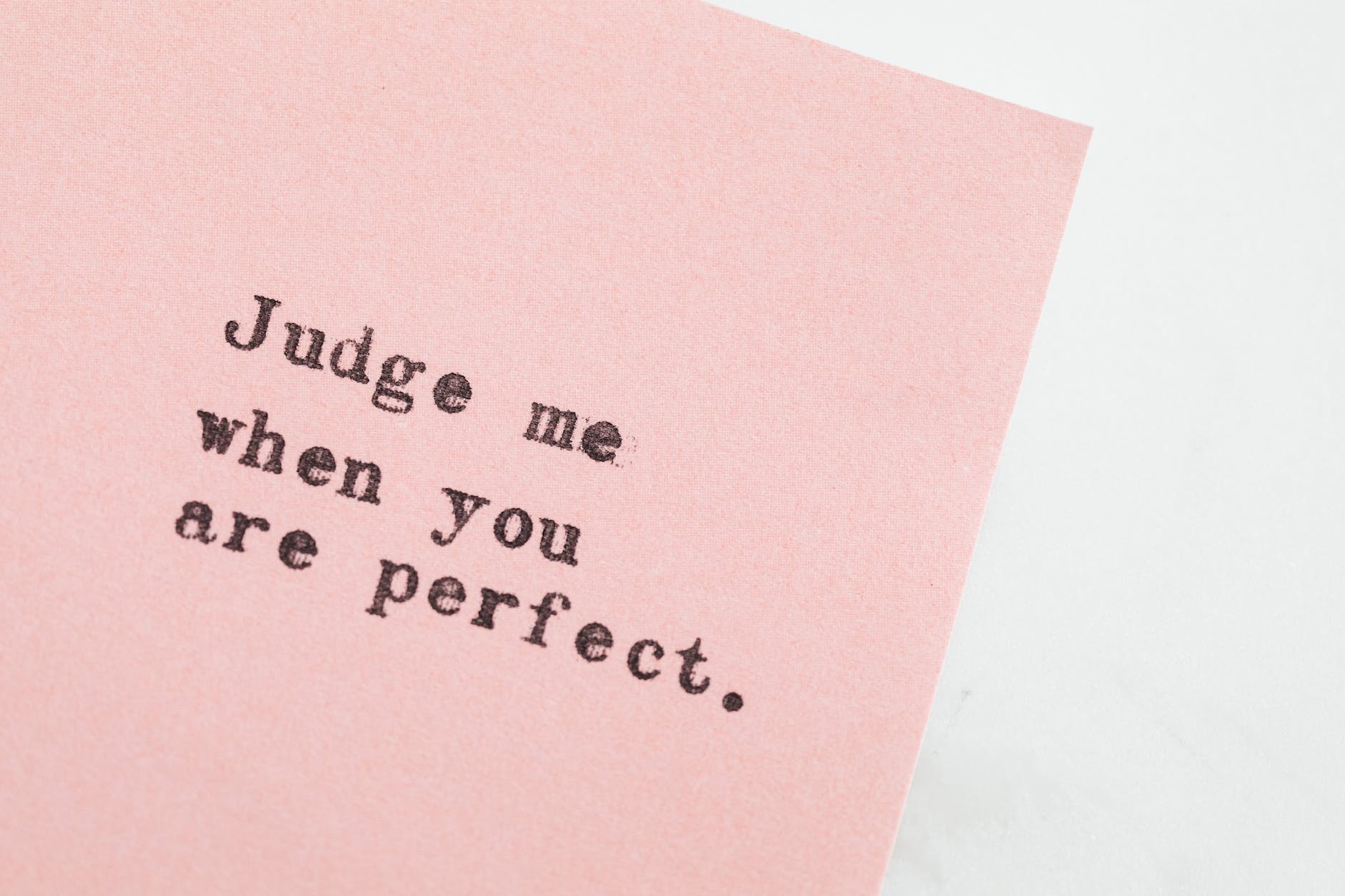 typed message on pink paper