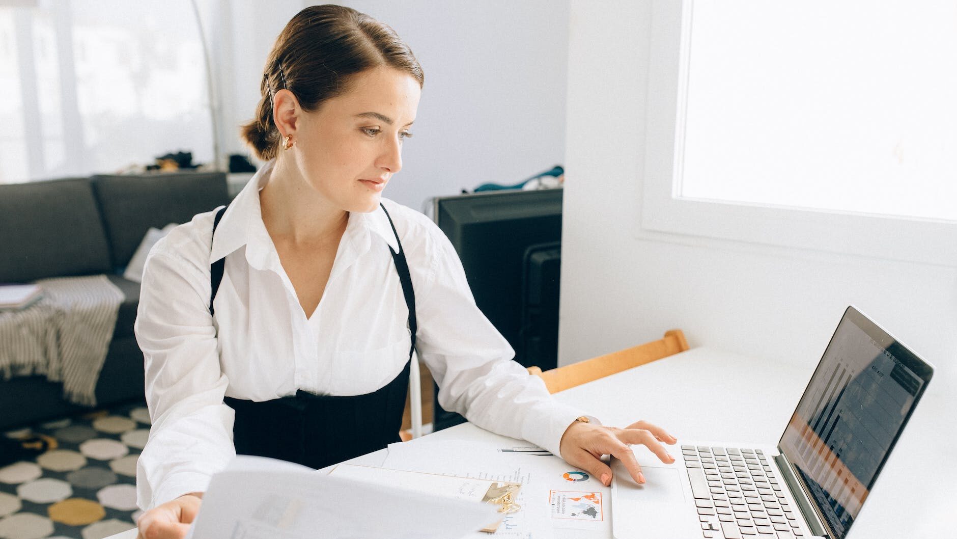 a woman using a laptop